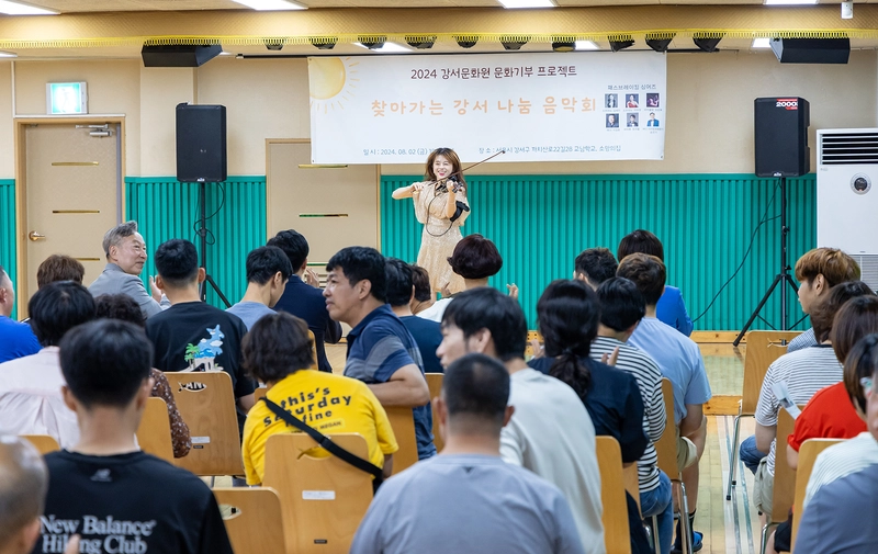 지난해 찾아가는 음악회를 열었던 소망교회 장애우들이 좋아하는 모습